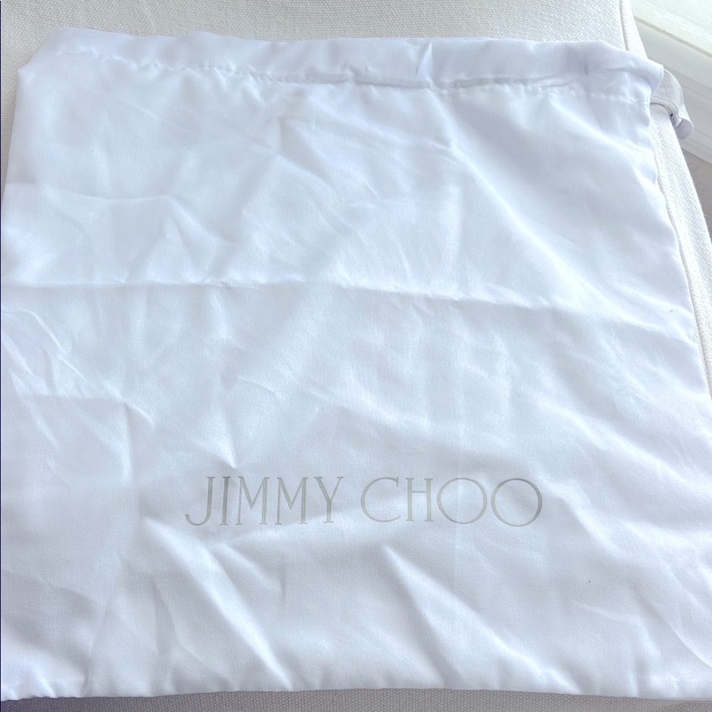 EUC Jimmy Choo, white drawstring bag, gray lettering and gray ribbon 13" x 14"